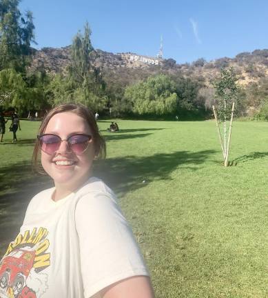 Alex Bisanzio in front of the iconic Hollywood sign