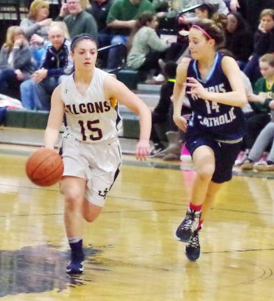 Jefferson's Ashley Hutchinson dribbles the ball while covered by Morris Catholic's Mimi Rubino.