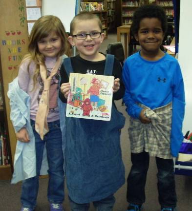 Students read 'Thomas' Snowsuit' From left, Cassandra Palley, Michael Guerino, Christopher OþÄôBryant.