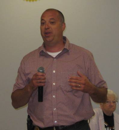Vernon Leisure Club meets the Chief PHOTO BY JANET REDYKENew Police Chief Daniel B. Young added information as well as humor, as he spoke to the Vernon Leisure Club.