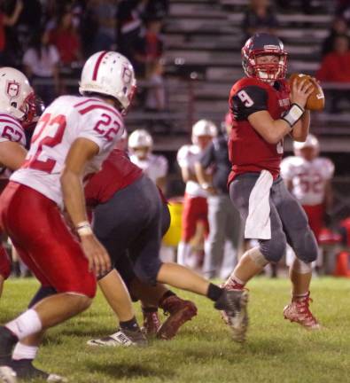 High Point quarterback Jacob Liscinsky holds the ball as he scans the field for an open receiver in the fourth quarter.