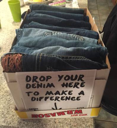 A box of jeans is shown.