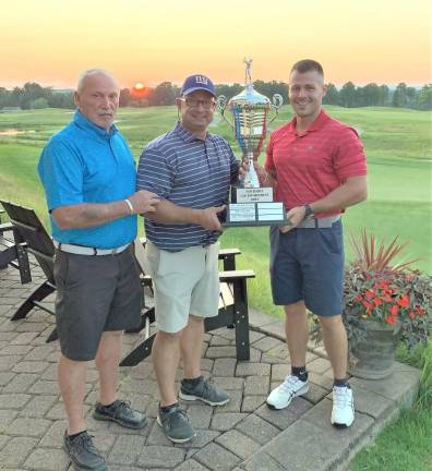 Camaraderie, remembrance of the fallen at New Jersey Law Enforcement Open Harry Phillips, executive director of the Policy Unity Tour, with the winners, Robert Del Corpo and Jeffrey Hilbert of the Bergen County Sheriff’s Office (Photo provided)