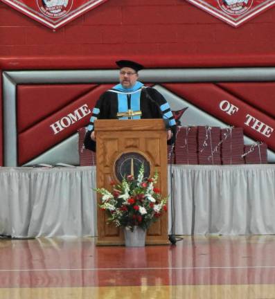 PHOTOS BY VERA OLINSKI Superintendent Scott D. Ripley addresses the High Point graduates.