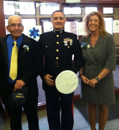 Marty Schweigardt, center, is shown with Colonel Colfax and Hardyston Township Manager Marianne Smith.