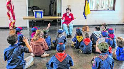 Deb Reidmiller speaks to Cub Scout Pack 150 of Sparta about disabilities. (Photos provided)