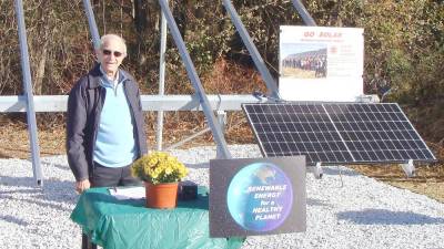 Administrative partner Alan Spector begins a short explanation of community shared solar energy.