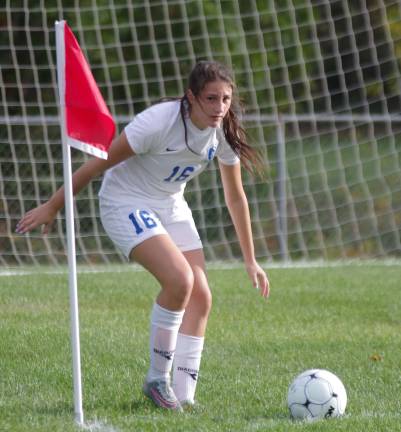 Kittatinny's Ally Benziger looks out onto the field before kicking the ball into play.