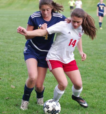 Vernon's Sydney Bolcato and High Point's Victoria Harnett pursue the ball in the second period. High Point Regional High School defeated Vernon Township High School (Glenwood, N.J.) in girls varsity soccer on Thursday, October 12, 2017. The final score was 1-0. The game took place at High Point Regional High School in Sussex, New Jersey.