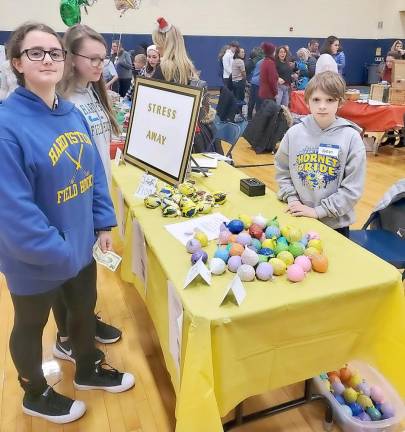 Addyson and Evie check out the sticky squishy stress balls.