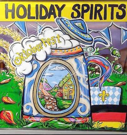 Artist gives businesses a boost with holiday paintings A painted holiday window at Shop Rite Liquors in Byram