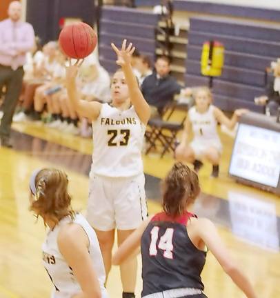 Jefferson's Deanna Torsiello (23) releases the ball during a long range shot in the first half. Torsiello scored 3 points.