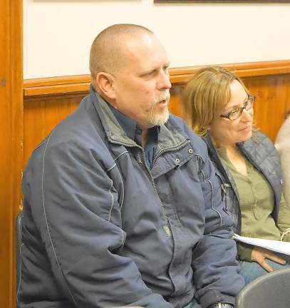 From left, Ogdensburg Board of Education Vice President Brendan Donegan asks about a pending school traffic ordinance, with President Toni Corban on right.