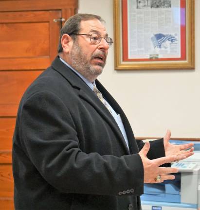 Ogdensburg approves $262K bond ordinance PHOTO BY VERA OLINSKIWilliams, Alexander & Associates President Alan Katz explains the municipal collection management service.