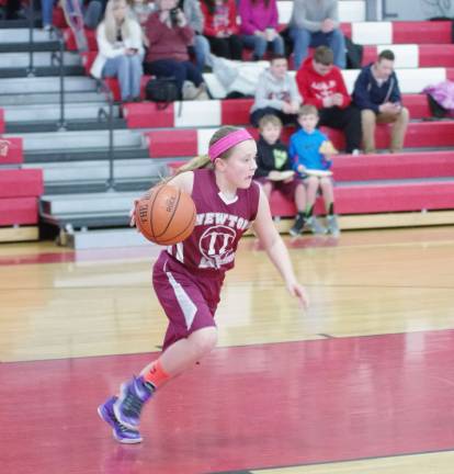 Newton's Olivia Buckley on the move with the ball.