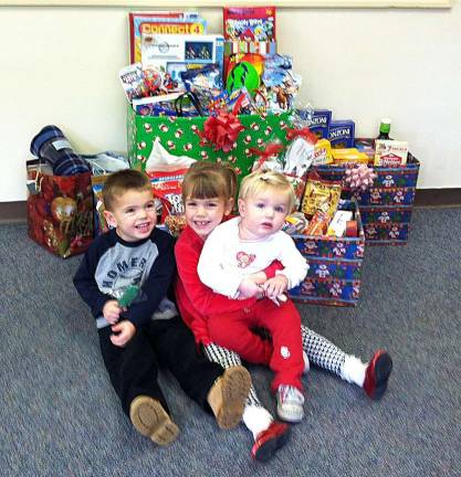 Nathaniel, Samantha and Julia of Vernon helped make the Sussex Bank collection a success last year with their donation.
