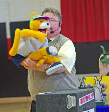 Firefighter Phil, portrayed by ventriloquist Dave Carr is shown with &#xfe;&#xc4;&#xfa;Al E. Cat.&#xfe;&#xc4;&#xf9;