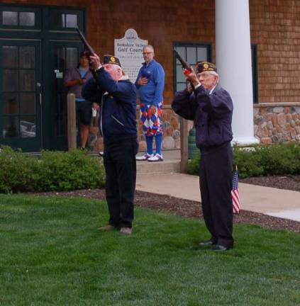 Larry Brain and Joe Mikowski fire a three round salute during the Flag raising ceremony at the Berkshire Valley Golf Course.