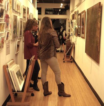 Attendees at the opening of the &quot;Small Works&quot; Perfect for Giving&quot; art show at the Skylands Gallery had a chance to speak with the artists and peruse the numerous works of art.