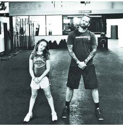 Sparta native launches work out clothing line Photos provided Bob Harper, Trainer Bob from the Biggest Loser, wearing a #shutupandlift shirt and his niece wearing out "Pullups cleans kettlebell swings that's what girls are made of" burnout shirt.