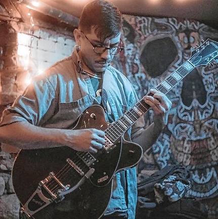 Live music: Tributes to Queen, Moody Blues on tap <b>Indie-folk singer-songwriter Justin Cole plays Thursday, July 24 at Krogh’s Restaurant & Brew Pub in Sparta. (Photo courtesy of Justin Cole)</b>