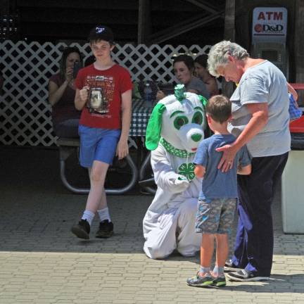 The 4H mascot made the rounds greeting visiting children and making new friends.