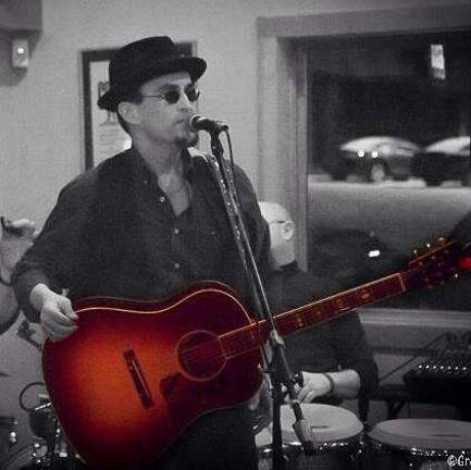 Don Lowe hosts the Monthly Singer Songwriter Showcase John Irizarry.