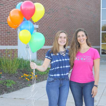 From left, Isobel Costello and Danielle Barris pause for a moment