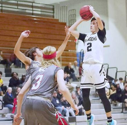 Wallkill Valley's Daniel Falk leaps during a shot attempt in the second quarter. Falk scored 4 points.