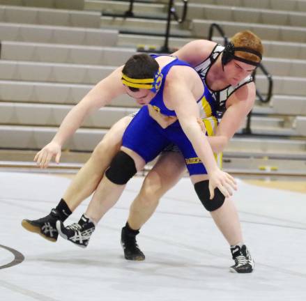 Wallkill Valley's Connor Andrews holds North Brunswick's John Helstowski in the 220 lb category.