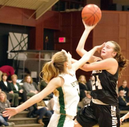 Wallkill Valley's Emma McGuire is fouled by a Veritas opponent during a shot attempt in the first half. McGuire scored five points.