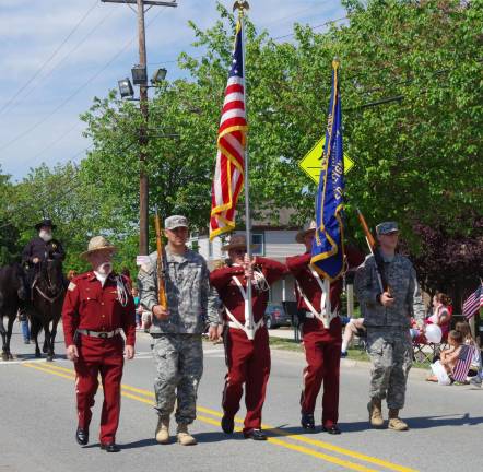 Township’s annual veteran’s tradition continues Honor guard leading the parade down Church Street. The soldiers in uniform are both Vernon home town boys. James Glading from Barry Lakes (second from left) and Jasen Bellusci of Cliffwood Lake (at the far right).