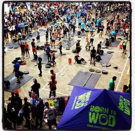 Sparta native launches work out clothing line Born to WOD's tent at a CrossFit competition in New York City at the NY Armory.