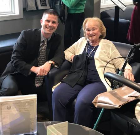 Thom LoGuidice is shown with holocaust survivor Margit Feldman