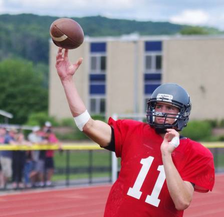 Wallkill Valley quarterback Alex Mastroianni practices throwing the ball.
