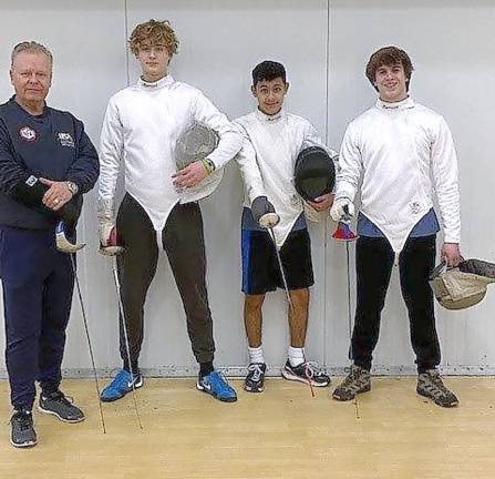 Pope John fencer from Hamburg finishes fourth in state championships From left: Coach Mark Trudnos, Allen Trudnos, Roman Concha, Benjamin (Ben ) Giralt (Photo provided)
