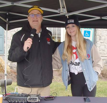 WSUS morning host Steve Andrews and Maggie Reid conducted a live broadcast for Stuff the Bus at First Hope Bank.