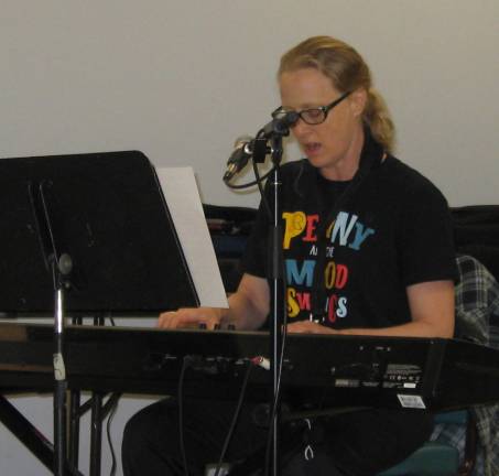 Penny and the Mood Swings entertain seniors Amy Crafton plays the keyboards and also saxophone.