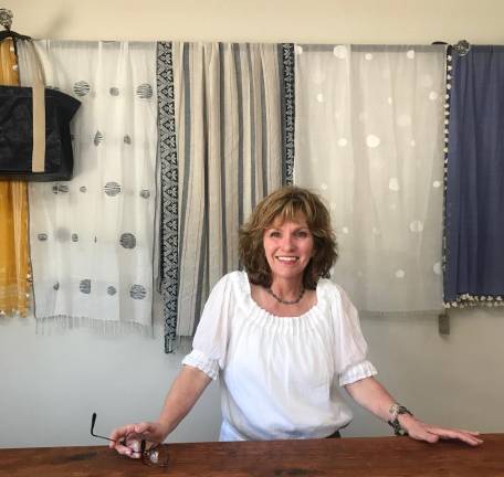 Vivian's Boutique vibrant with style PHOTOS BY LAURIE GORDONVivian Hill, the owner of Vivian's Boutique
