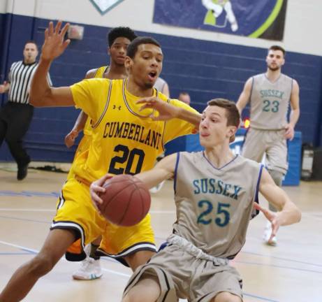 Sussex County's Ben Melville handles the ball. Melville scored 13 points.