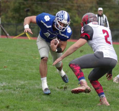 Kittatinny running back Jacob Mafaro carries the ball as he faces High Point defender Grayson Sabo in the first half. Mafaro rushed for 128 yards and 1 touchdown.