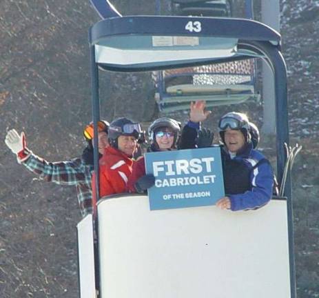 Mountain Creek opens for season Buffy & John Whiting, right and center ride the first cab with friends on opening day of the resort.