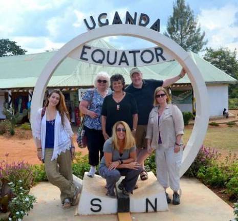 Trip to Uganda is 'soul changing' At the equator in Uganda, Vernoy Paolini, back row, left, and others including Sylvia in the middle.