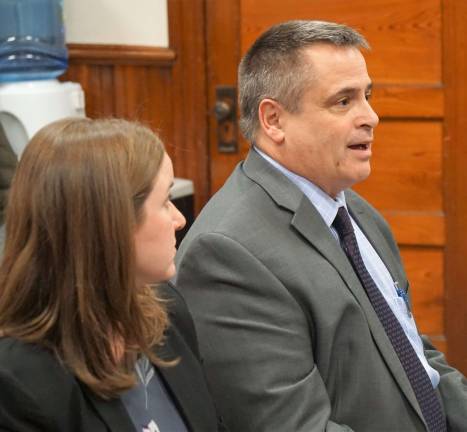 PHOTOS BY VERA OLINSKIOn right, the Elizabethtown Gas Director of Sales Gary Marmo confirms their meeting will be April 10, with Michelle Beatty listening on left.