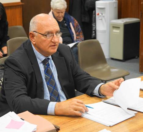 PHOTO BY VERA OLINSKIBorough Engineer Eugene Buczynski reviews the new driveway ordinance.