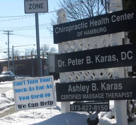 The outside signs of the Chiropractic Health Center of Hamburg give the passer-by a wealth of health information.