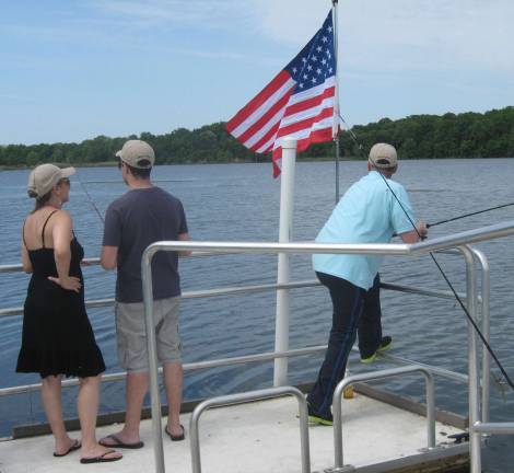 New Jersey hosts Free Fishing Day Veterans fish at the lake at Owen Station.
