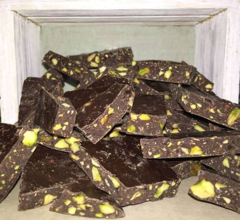Photos, Rose Mountain Chocolatier Facebook Dark chocolate bark with fresh roasted pistachio nuts.