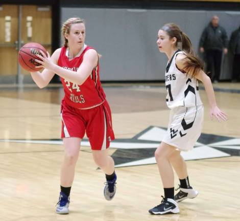 Morris Hills Lauren Sysyn holds the ball while covered by Wallkill Valley's Ally Lame.