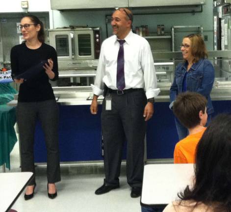 PHOTO BY LAURA J. MARCHESE From left, Leanne Paolazzi, Superintendent Principal David Astor and Board of Education ton Corban are shown.